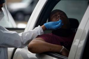 Texas halts reopening as US virus cases soar.jpg
