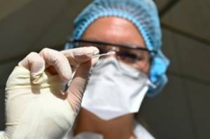 Covid-19 vaccine trial paused after unexplained illness.jpg