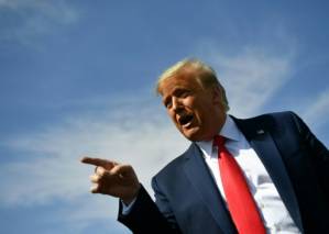 Trump calls for investigation of Biden, heads to key battleground.jpg