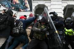 Report on Capitol Hill riot criticizes police preparation, response.jpg