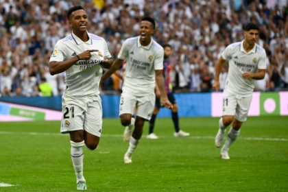 Unbeaten Madrid defeat Barcelona in Clasico to top La Liga.jpg