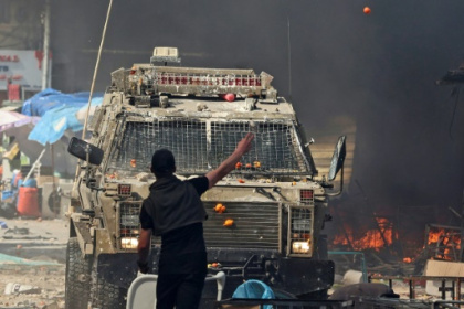 11 Palestinians killed, dozens shot in Israel West Bank raid.jpg