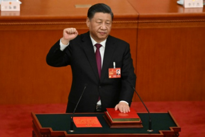 China's Xi handed historic third term as president.jpg
