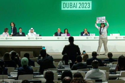 UN climate summit to run overtime as fury mounts on fossil fuels.jpg