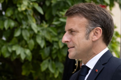 Macron pledges 'change' as French far right eyes parliament rout.jpg