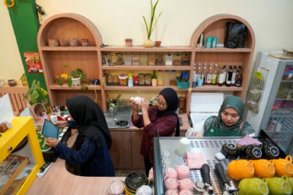 Woman-owned cafe in Indonesia's Sharia stronghold shakes stigma.jpg