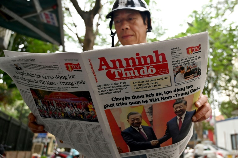 Xi warns protectionism 'leads nowhere' as he arrives in Vietnam