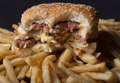 Obesity has soared has people eat more unhealthy foods, researchers have warned