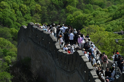 Two Japanese tourists in their 20s were detained for two weeks in China then deported for taking photos showing exposed buttocks at the Great Wall