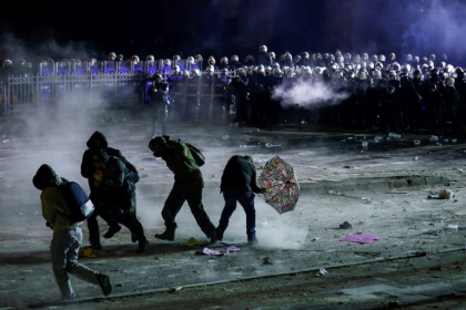 Riot police have fought running battles with protesters since Thursday night