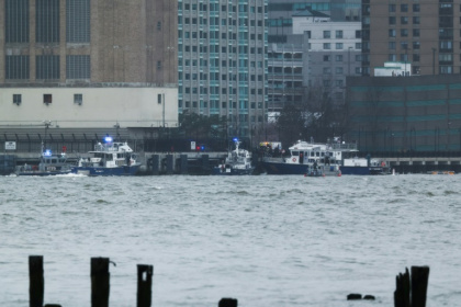 Rescue boats are seen in Hoboken, New Jersey, after a helicopter crashed into the Hudson River