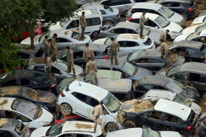Soldiers search wrecked cars after flooding in Valencia, Spain, on November 8, 2024