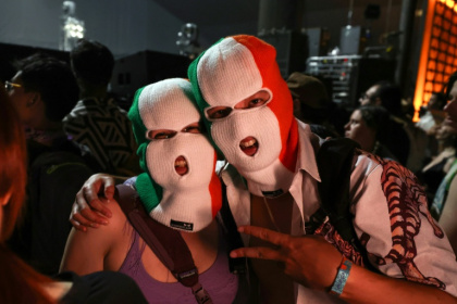 Fans of Irish hip hop trio Kneecap wait for the band to perform at the Coachella Festival in California - VALERIE MACON (AFP)