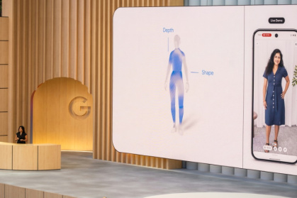 Google advertising and commerce vice president Vidhya Srinivasan shows a new shopping feature that uses artificial intelligence to enable people to virtually try on clothes using their own pictures of themselves - Camille Cohen (AFP)