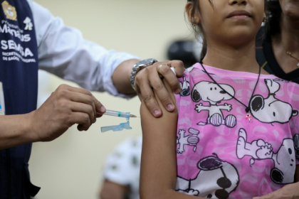 More than half of the world's completely unvaccinated children live in just eight countries, research finds - Michael Dantas (AFP)