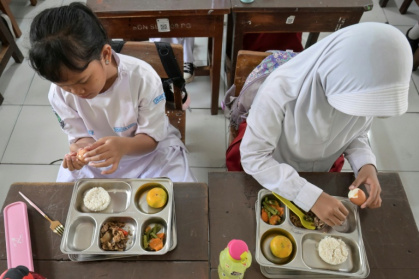 Indonesian President Prabowo Subianto touted a billion-dollar free meal programme as a solution to the high rates of stunted growth among children - BAY ISMOYO (AFP)