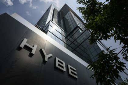 HYBE, the agency behind K-pop megastars BTS, was raided by police over allegations of fraudulent trading - ANTHONY WALLACE (AFP)
