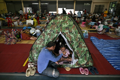 The Thai interior ministry said more than 100,000 people from four border provinces had been moved to nearly 300 temporary shelters - Lillian SUWANRUMPHA (AFP)