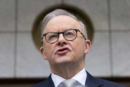 The dictionary cited Australian Prime Minister Anthony Albanese's use of the phrase 'delulu with no solulu' - MIKE BOWERS (AFP)