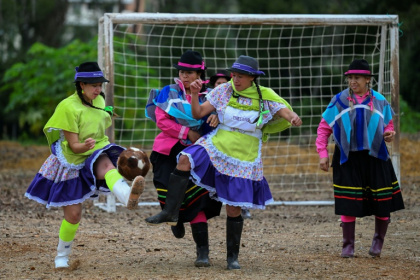 Colombian women farmers in Boyaca show off their footwork in the 'Boot, Poncho and Hat' football tournament held each August - Luis ACOSTA (AFP)