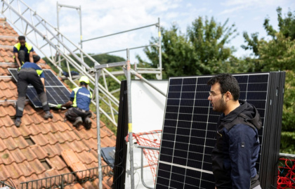 Success story: Afghan Rostam Nazari (right) employs 32 people in his solar panel installation company in Germany - Hannes P. Albert (AFP)