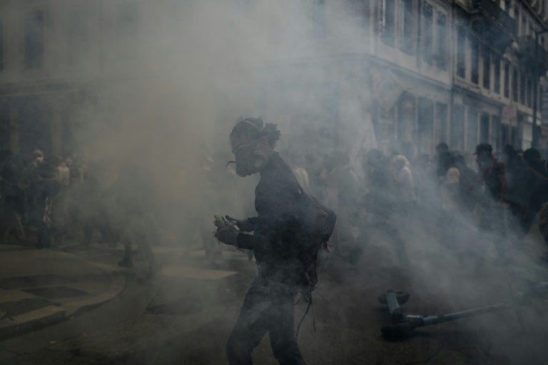 New French PM vows 'profound break' with past as protests flare