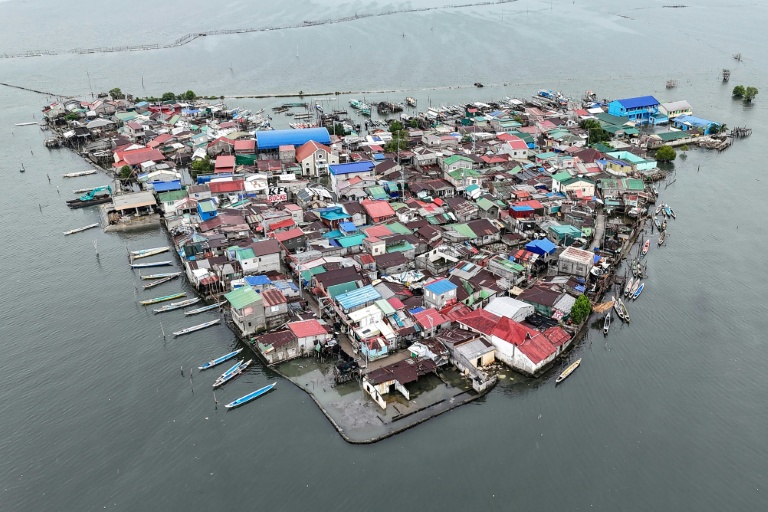 Against the tide: Filipinos battle rising sea on sinking island