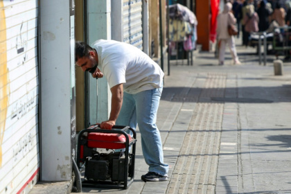 Prolonged power cuts have become routine in Iran - - (AFP)
