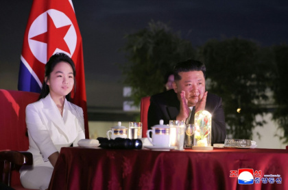 Kim Jong Un's daughter Kim Ju Ae (L) has been seen at his side at a number of public events - STR (AFP)
