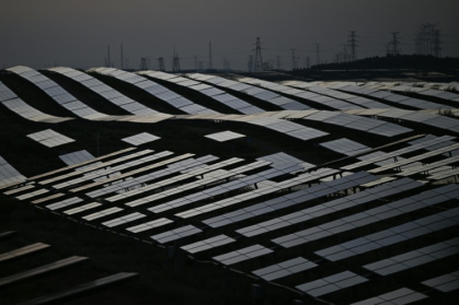 Solar panels at the Dalat Banner Photovoltaic Station in the Kubuqi desert near Ordos, in China's northern Inner Mongolia region - Pedro Pardo (AFP)