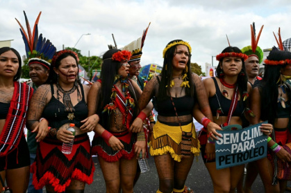 Women and girls face disproportionate impacts from climate change, the UN says, largely because they make up the majority of the world's poor and rely heavily on local natural resources for their livelihoods - Pablo PORCIUNCULA (AFP)