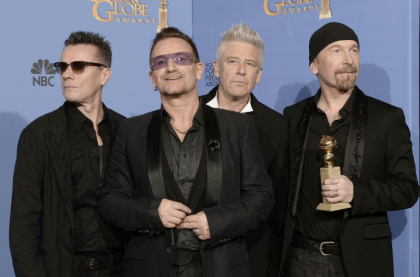 U2, seen here in 2014, became one of the world's biggest bands in the 1980s - KEVIN WINTER (AFP)