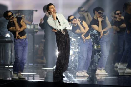 British singer Harry Styles opened the Brit Awards with a performance of his new single - Adrian Dennis (AFP)