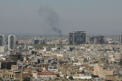 A plume of smoke rises following an interception of a drone in Erbil, Iraq on March 12, 2026 - Shvan HARKI (AFP)