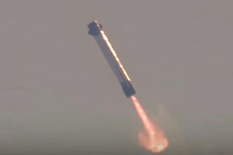 Blue Origin launches rocket with used booster for first time