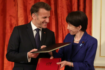 French President Emmanuel Macron (pictured with Japanese Prime Minister Sanae Takaichi) praised Europe's 'predictability' in an apparent swipe at Donald Trump during a visit to Tokyo - Ludovic MARIN (AFP)