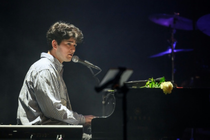 Swiss singer Gjon's Tears performed during the tribute concert - Fabrice COFFRINI (AFP)