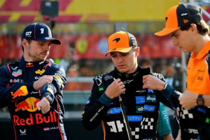 McLaren duo Lando Norris (C) and Oscar Piastri (R) feel F1 would be worse off if Max Verstappen were to walk away from the spot - Andrej ISAKOVIC (AFP)