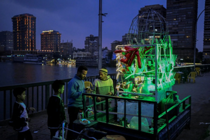 A millennium old and home to over 20 million people, Cairo is known for nights that come alive - Khaled DESOUKI (AFP)