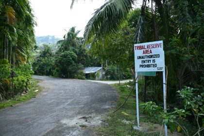 A board marks a tribal reserve area on the outskirts of Campbell Bay at Great Nicobar island - R. Satish BABU (AFP)