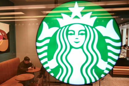 Starbucks Korea revealed on Tuesday a series of mishaps leading to its heavily criticised "Tank Day" promotion - Pedro PARDO (AFP)