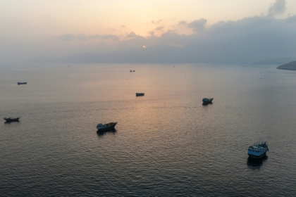 This aerial photograph shows boats anchored off Oman's northern Musandam Peninsula near the Strait of Hormuz on June 27, 2026 - - (AFP)