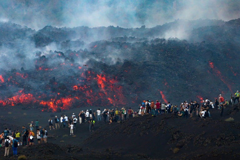Tourists rush to Mount Etna as Italian volcano erupts