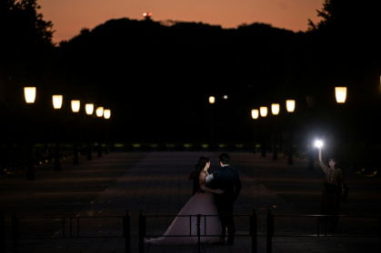 People prepare for a wedding photo shoot near Tokyo station during evening hour in Tokyo on May 23, 2021 - Philip FONG (AFP)