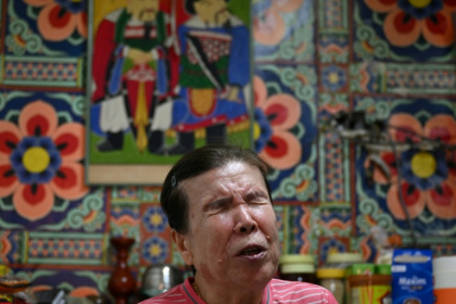 Song Oh-soon, 86, is one of the last members of a South Korean community of visually impaired fortune-tellers - GREG BAKER (AFP)