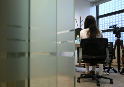 Victims of workplace harassment are often expected to keep silent while employers have no clear legal duty to tell them how their cases ended - Jung Yeon-je (AFP)