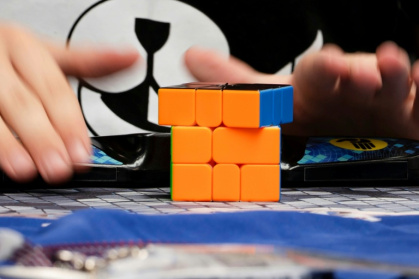 Young speedcuber Lian Yunzhi breaks the women's 3x3 average world record twice in September - Lina Selg (AFP)