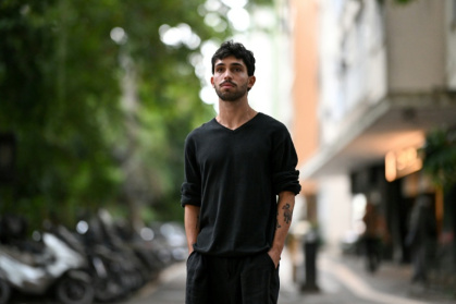 Eduardo Metzker, 29, watched in horror as his bank applications were drained of around $15,000 after his cellphone was stolen in an armed robbery - MAURO PIMENTEL (AFP)